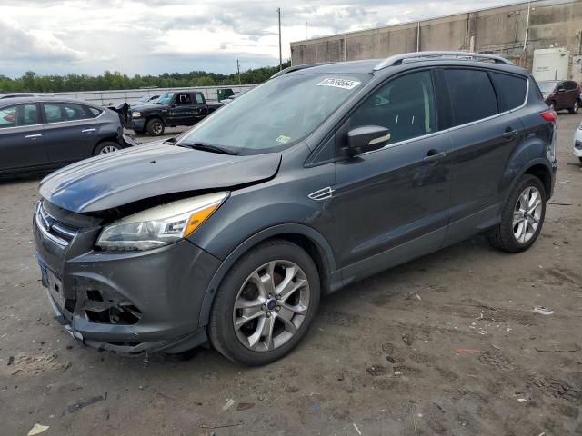 FORD ESCAPE TIT 2016 with VIN 1FMCU0J99GUB35149 - Photo from auction
