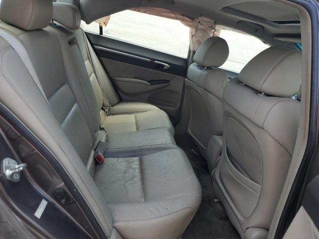 Photo 10 from auction – 2010 HONDA CIVIC EXL with VIN 19XFA1F90AE016789
