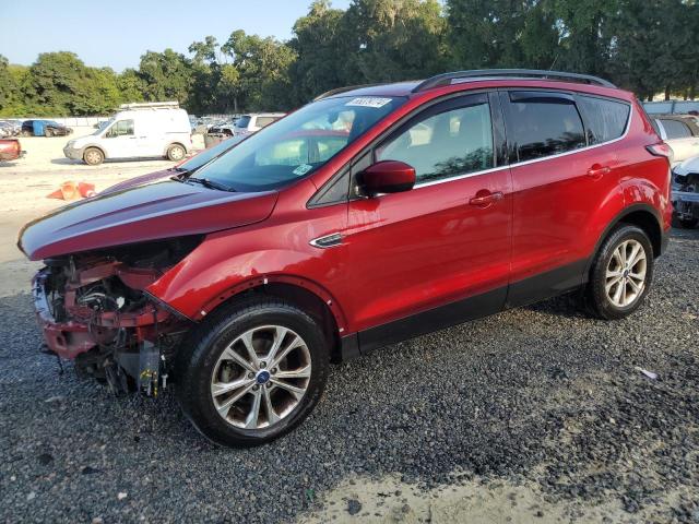FORD ESCAPE SE 2018 with VIN 1FMCU0GD0JUC16494 - Photo from auction