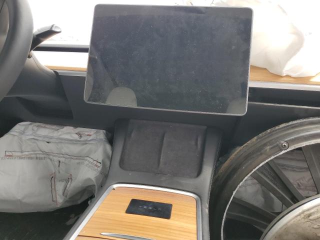 Photo 9 from auction – 2023 TESLA MODEL Y with VIN 7SAYGAEE6PF899504