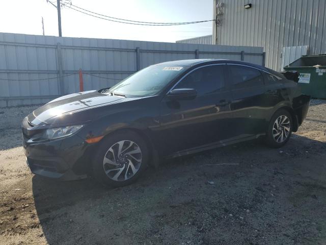 HONDA CIVIC EX 2017 with VIN 19XFC2F75HE058464 - Photo from auction