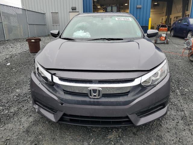 Photo 5 from auction – 2017 HONDA CIVIC LX with VIN 2HGFC2E53HH034184