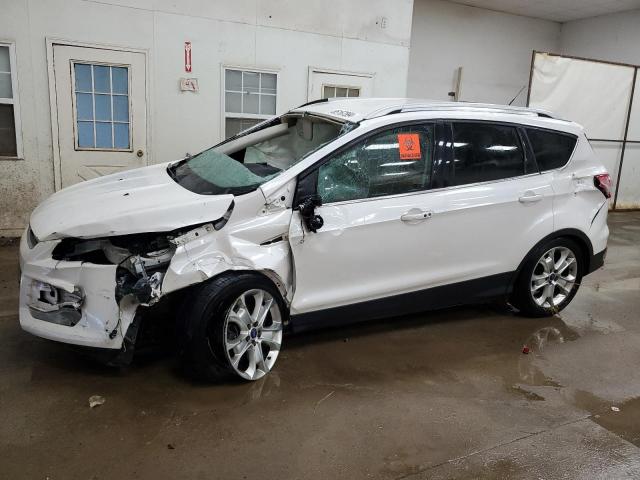 FORD ESCAPE TIT 2016 with VIN 1FMCU0J92GUB96049 - Photo from auction
