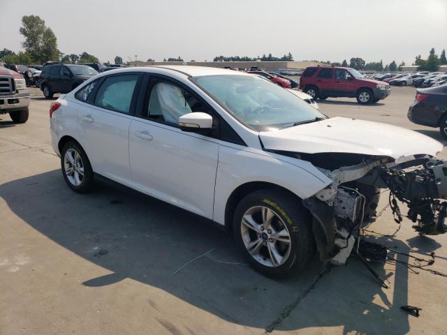Photo 4 from auction – 2014 FORD FOCUS SE with VIN 1FADP3F25EL371531