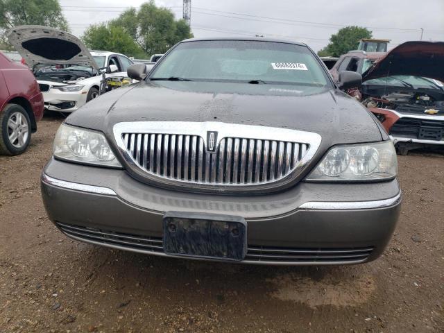 Photo 5 from auction – 2004 LINCOLN TOWN CAR E with VIN 1LNHM81W54Y606258