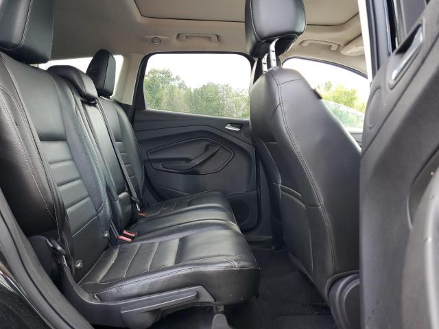 Photo 11 from auction – 2014 FORD ESCAPE TIT with VIN 1FMCU9JX1EUD69513