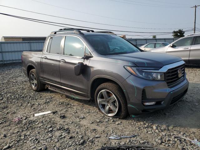 Photo 4 from auction – 2023 HONDA RIDGELINE with VIN 5FPYK3F53PB032171