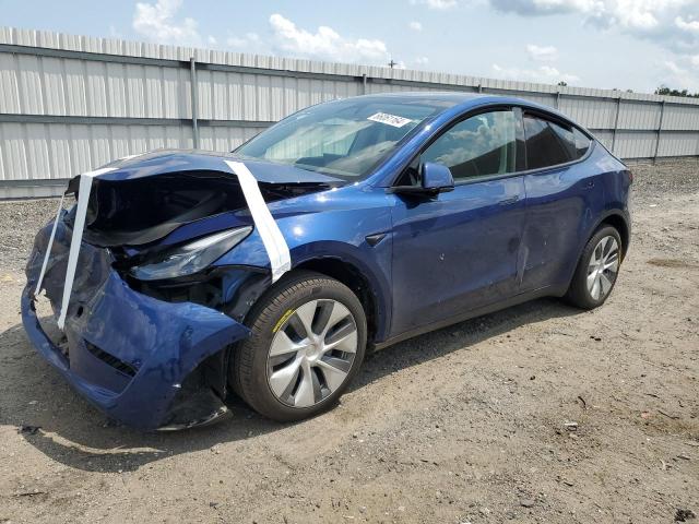 TESLA MODEL Y 2024 with VIN 7SAYGDEE8RA271994 - Photo from auction