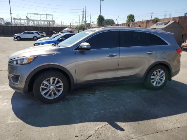 KIA SORENTO LX 2018 with VIN 5XYPG4A57JG385306 - Photo from auction