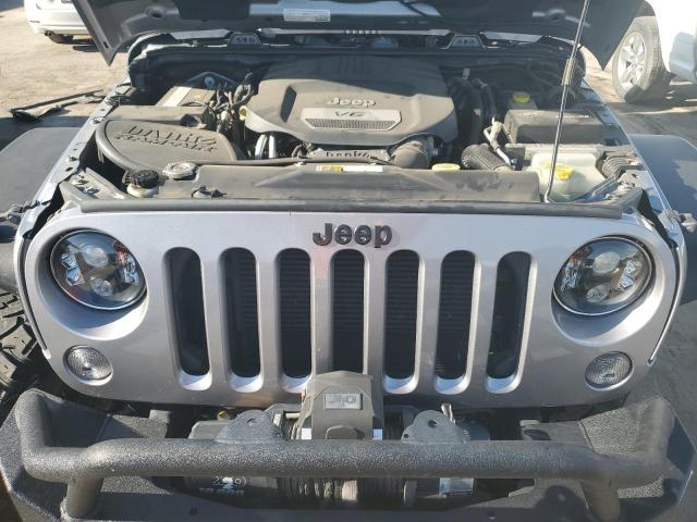 Photo 12 from auction – 2015 JEEP WRANGLER U with VIN 1C4BJWFG9FL620611