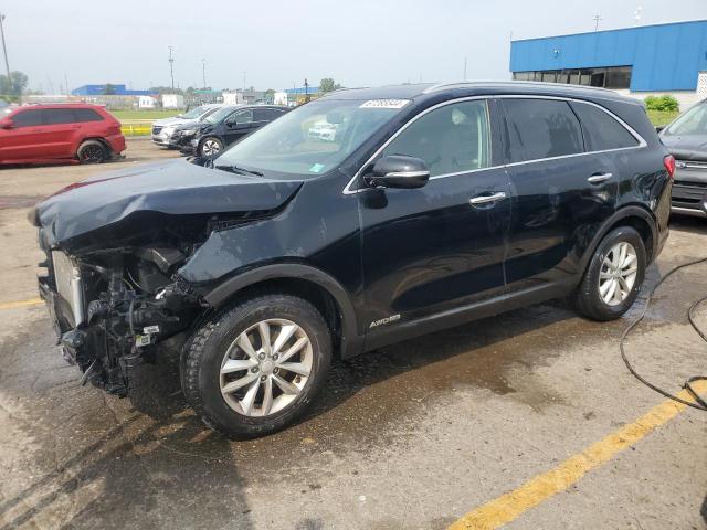 KIA SORENTO LX 2017 with VIN 5XYPGDA55HG325311 - Photo from auction