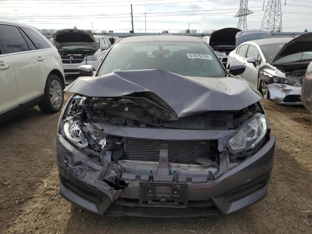 Photo 5 from auction – 2017 HONDA CIVIC LX with VIN 19XFC2F55HE026595