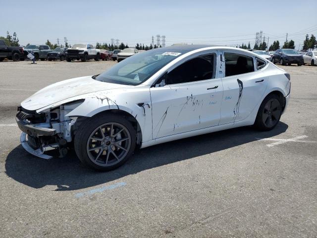 TESLA MODEL 3 2021 with VIN 5YJ3E1EB9MF938990 - Photo from auction