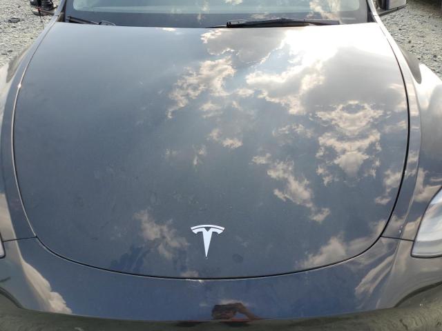 Photo 11 from auction – 2022 TESLA MODEL Y with VIN 7SAYGDEF9NF456514