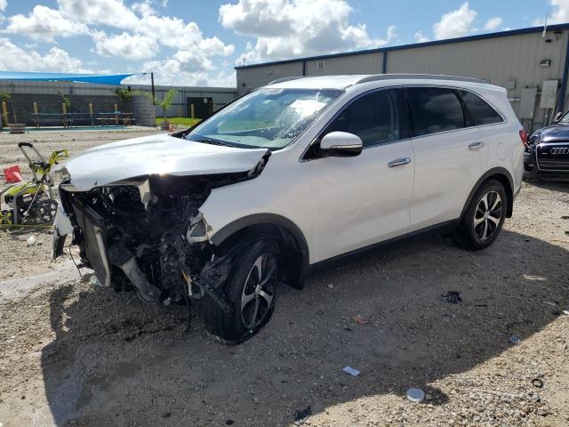 KIA SORENTO EX 2016 with VIN 5XYPH4A1XGG143810 - Photo from auction