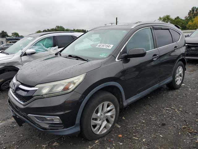 HONDA CR-V EX 2015 with VIN 2HKRM4H52FH600694 - Photo from auction