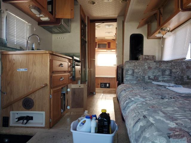 Photo 6 from auction – 2004 FORD E450 with VIN 1FDXE45S13HB84478