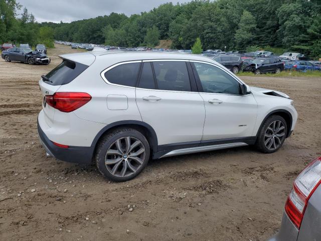 Photo 3 from auction – 2018 BMW X1 XDRIVE2 with VIN WBXHT3C35J5F92331