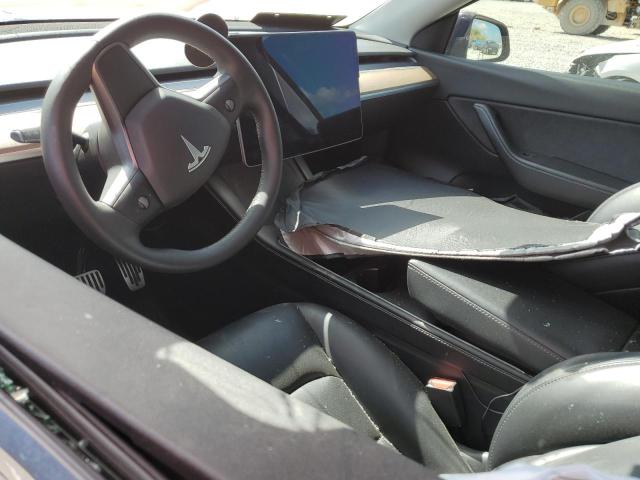 Photo 8 from auction – 2021 TESLA MODEL Y with VIN 5YJYGDEE0MF233152