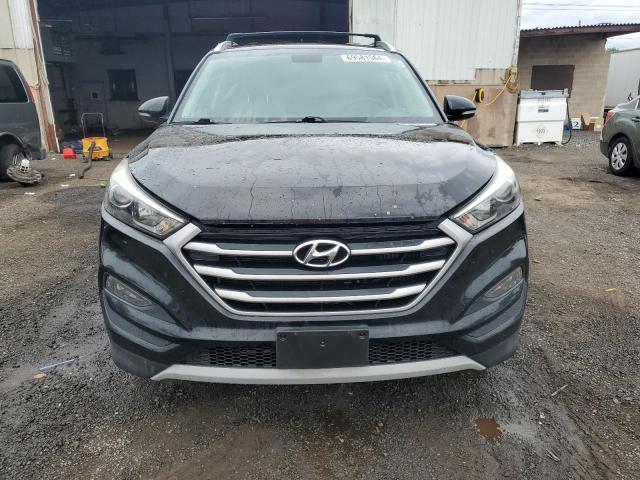 Photo 5 from auction – 2017 HYUNDAI TUCSON LIM with VIN KM8J3CA2XHU446699