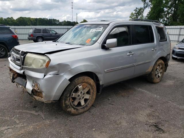 HONDA PILOT TOUR 2011 with VIN 5FNYF3H91BB043207 - Photo from auction