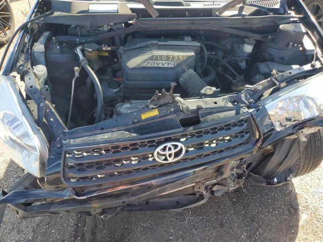 Photo 12 from auction – 2003 TOYOTA RAV4 with VIN JTEGH20VX30113078
