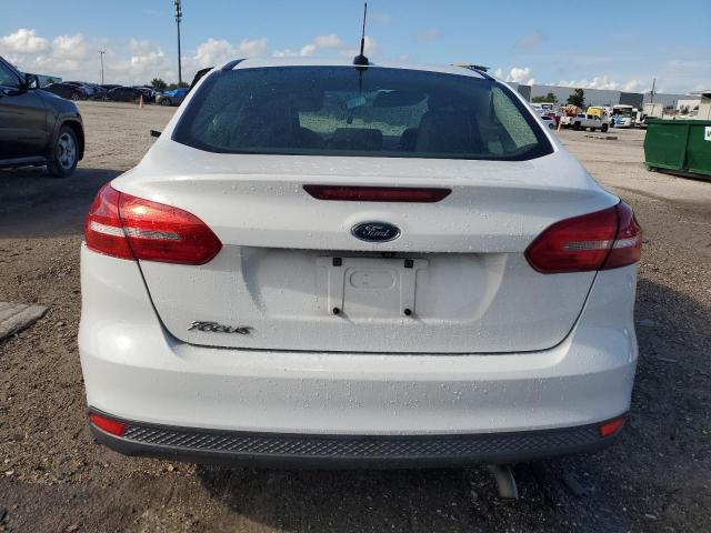 Photo 6 from auction – 2016 FORD FOCUS S with VIN 1FADP3E28GL339340