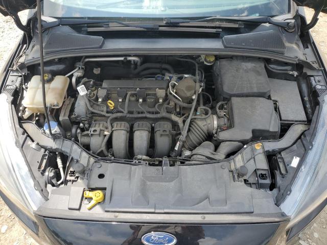 Photo 11 from auction – 2015 FORD FOCUS SE with VIN 1FADP3F27FL378675