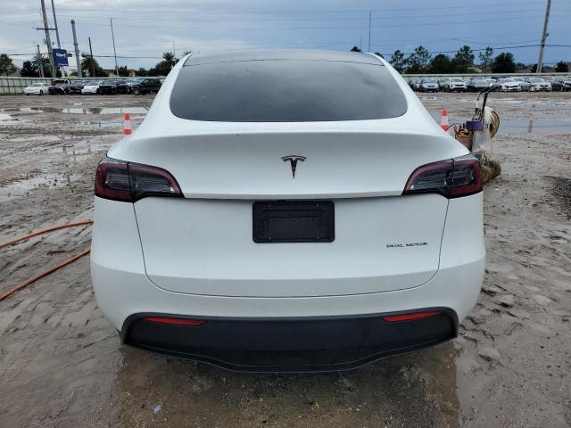 Photo 6 from auction – 2023 TESLA MODEL Y with VIN 7SAYGDEE1PA164458