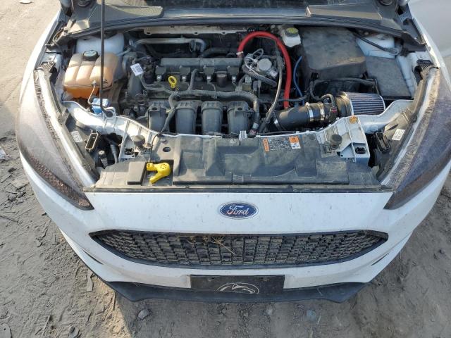 Photo 11 from auction – 2018 FORD FOCUS SE with VIN 1FADP3K28JL219372
