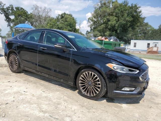 Photo 4 from auction – 2018 FORD FUSION TIT with VIN 3FA6P0D95JR128272