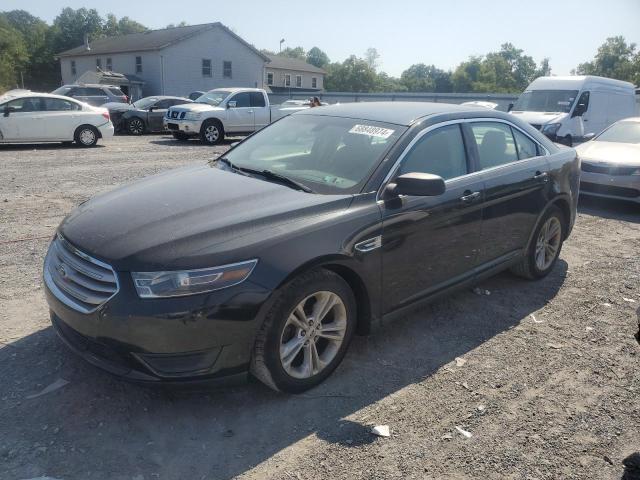 FORD TAURUS SE 2015 with VIN 1FAHP2D9XFG132613 - Photo from auction