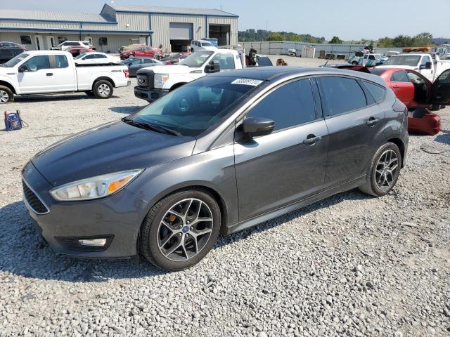 FORD FOCUS SE 2015 with VIN 1FADP3K28FL348204 - Photo from auction