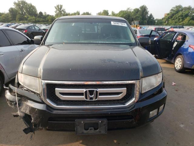 Photo 5 from auction – 2011 HONDA RIDGELINE with VIN 5FPYK1F5XBB001397