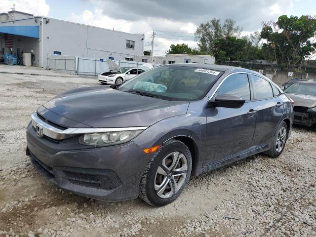 HONDA CIVIC LX 2018 with VIN 2HGFC2F57JH602876 - Photo from auction