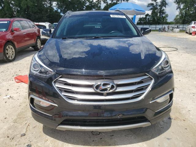 Photo 5 from auction – 2018 HYUNDAI SANTA FE S with VIN 5NMZU3LB5JH104253