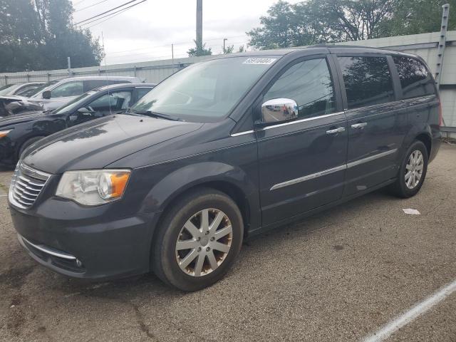 CHRYSLER TOWN & COU 2012 with VIN 2C4RC1CG3CR117028 - Photo from auction