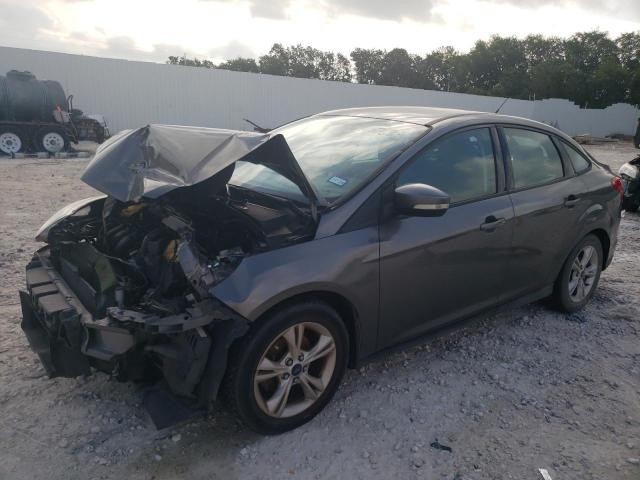 FORD FOCUS SE 2014 with VIN 1FADP3F26EL450853 - Photo from auction