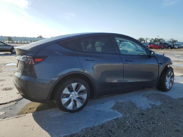 Photo 3 from auction – 2023 TESLA MODEL Y with VIN 7SAYGDEE9PA202230
