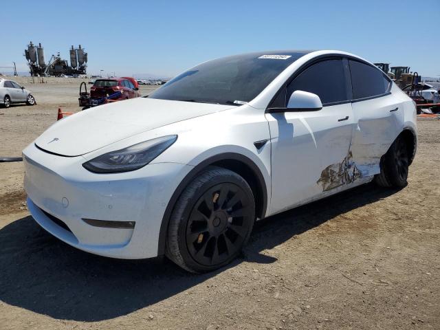 TESLA MODEL Y 2021 with VIN 5YJYGAEE8MF143648 - Photo from auction