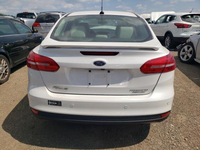 Photo 6 from auction – 2016 FORD FOCUS TITA with VIN 1FADP3J23GL379539