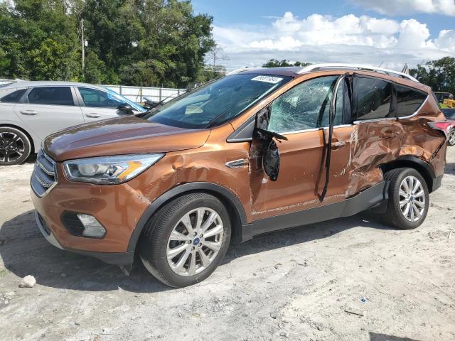 FORD ESCAPE TIT 2017 with VIN 1FMCU0J90HUA02765 - Photo from auction