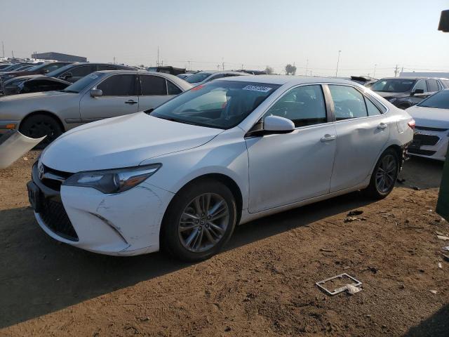 TOYOTA CAMRY LE 2017 with VIN 4T1BF1FK2HU697998 - Photo from auction