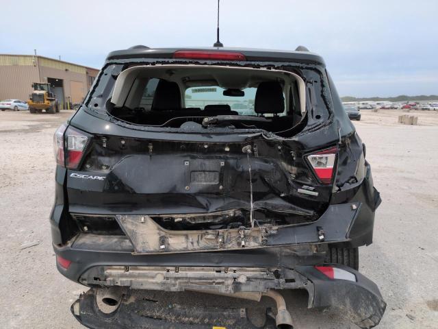 Photo 6 from auction – 2018 FORD ESCAPE SE with VIN 1FMCU0GD7JUC70052