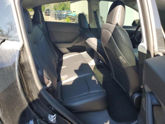 Photo 10 from auction – 2022 TESLA MODEL Y with VIN 7SAYGDEF1NF563766