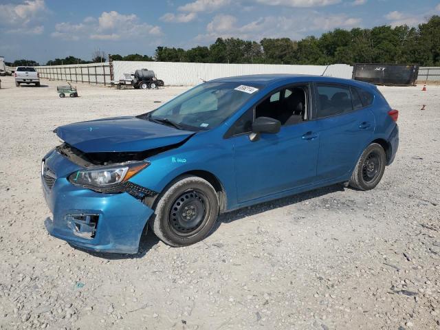 SUBARU IMPREZA 2018 with VIN 4S3GTAA62J1713413 - Photo from auction