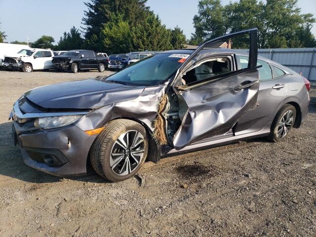 HONDA CIVIC EX 2016 with VIN 2HGFC1F48GH637503 - Photo from auction