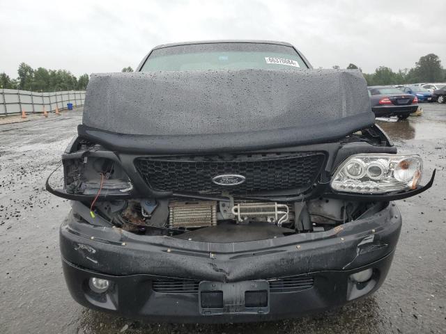 Photo 5 from auction – 2003 FORD F150 SUPER with VIN 1FTRW073X3KD04578