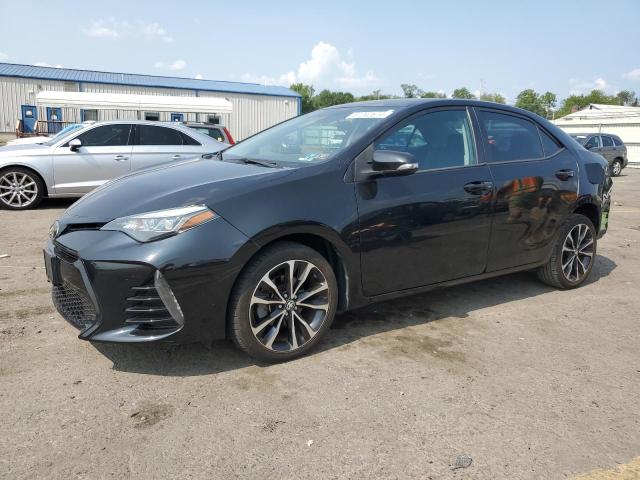 TOYOTA COROLLA L 2017 with VIN 5YFBURHE1HP697018 - Photo from auction