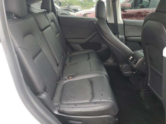 Photo 11 from auction – 2023 TESLA MODEL Y with VIN 7SAYGAEE3PF668110
